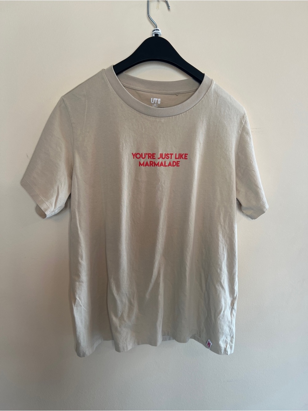 Uniqlo Beige Tee with Red Slogan